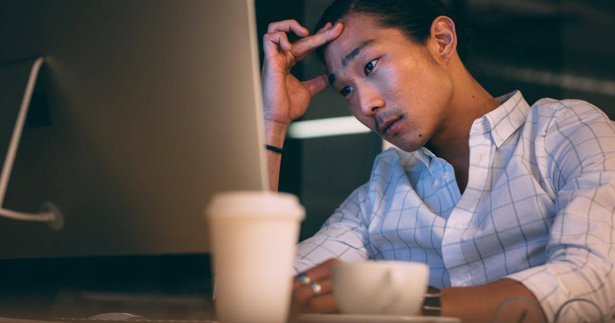 frustrated hr professional looking at screen